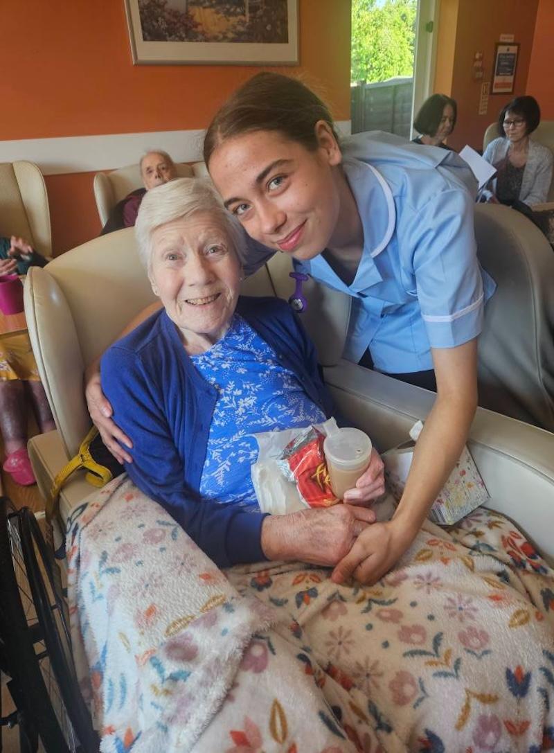 one of our residents with a carer