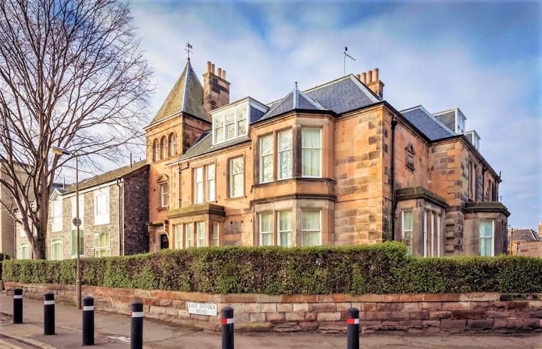 Exterior of St Margarets Care home in sunlight